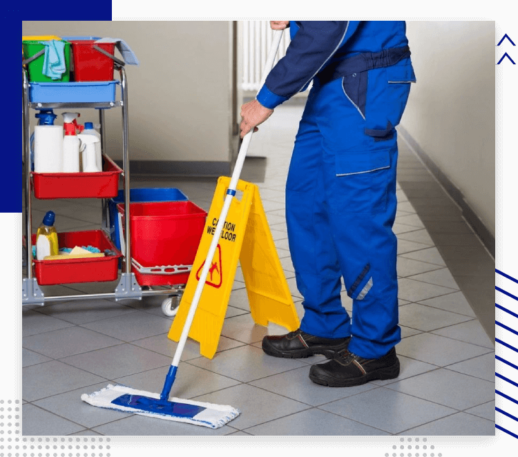 Janitor With Broom Cleaning Office Corridor